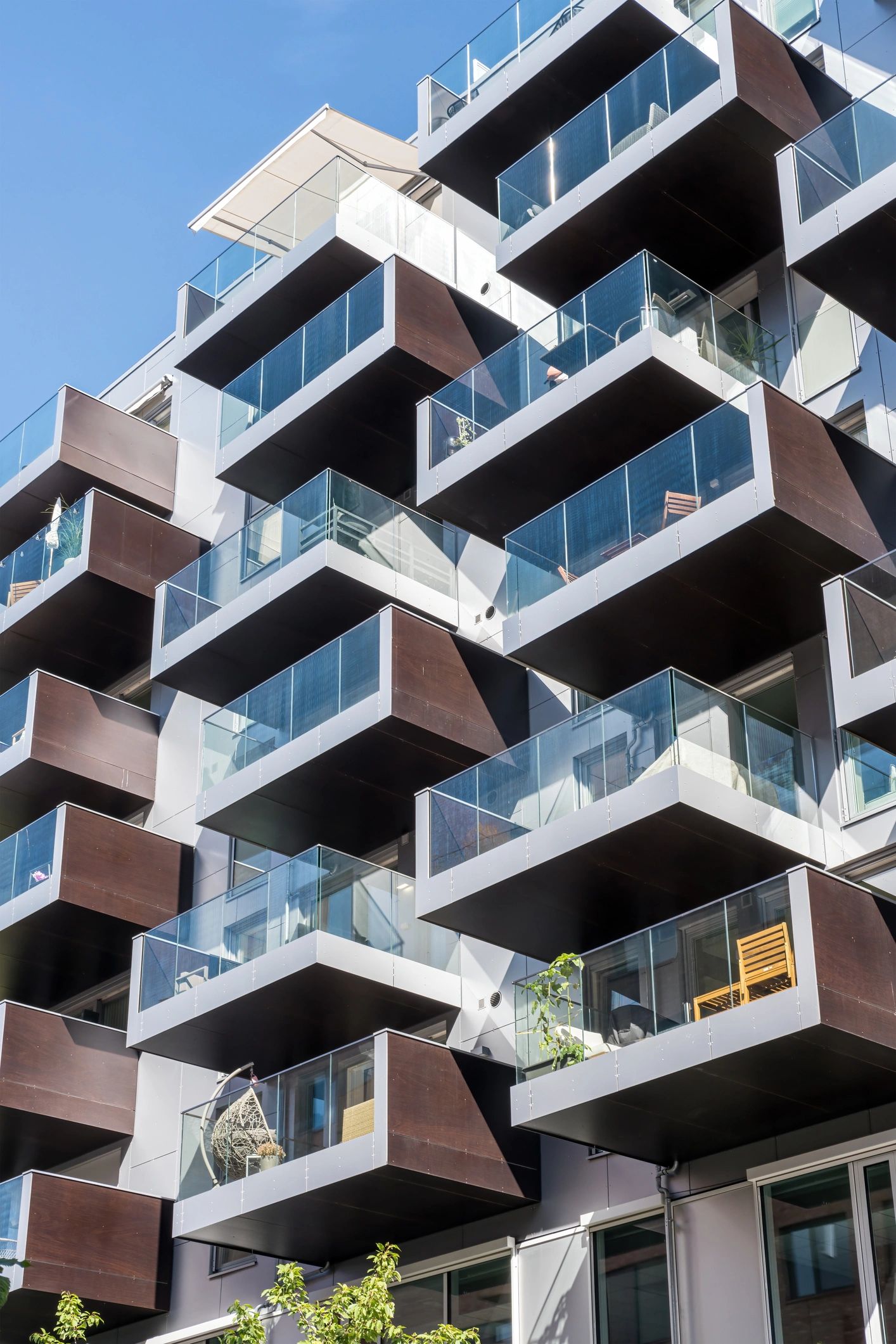Modern multifamily property with glass balconies